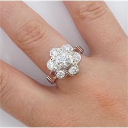 18ct white gold seven stone round brilliant cut diamond daisy flower head cluster ring, hallmarked, principal diamond 0.74 carat, with GIA report, total diamond weight approx 1.40 carat