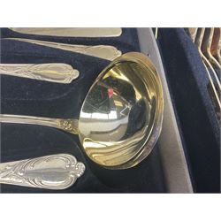 Bestecke Solingen canteen of gold plated cutlery for twelve place settings, including ladle, cake slice and serving spoons, contained within a briefcase, together with a matching set twelve of Bestecke Solingen gold plated fish knives and forks, in fitted case 