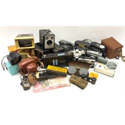 Collection of cameras, including Kodak Bantam coloursnap II, Kodak Brownie model I, Kodak instamatic, Halina 35X and three others, along with opera glasses and other items
