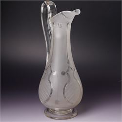 Victorian opaque glass ewer with clear cut decoration and clear glass handle H28cm and an etched glass claret jug with silver plated cover and handle H31cm