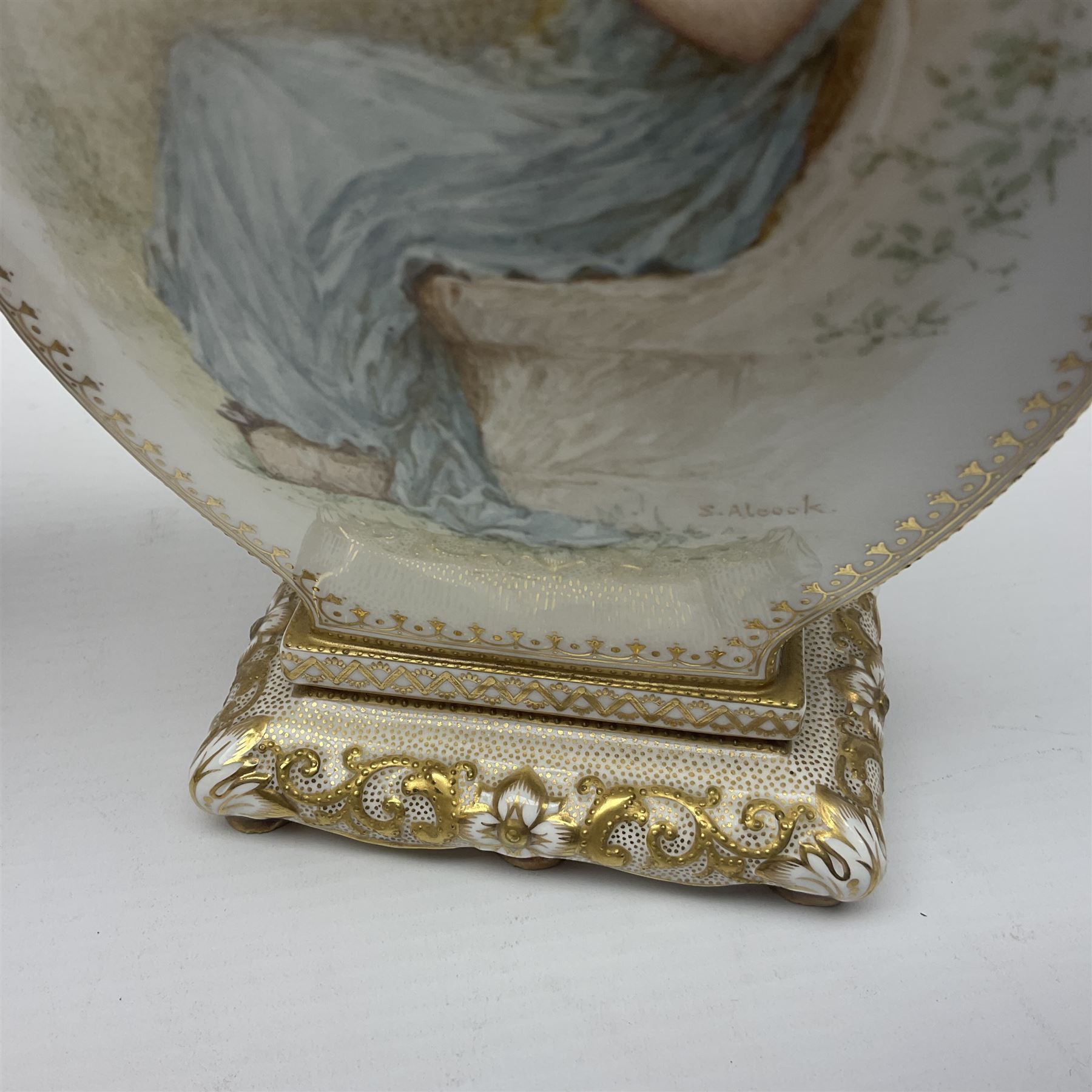 Pair of Copelands enamel jeweled twin handle vases, each decorated with a seated female figures, makers mark beneath, H22cm