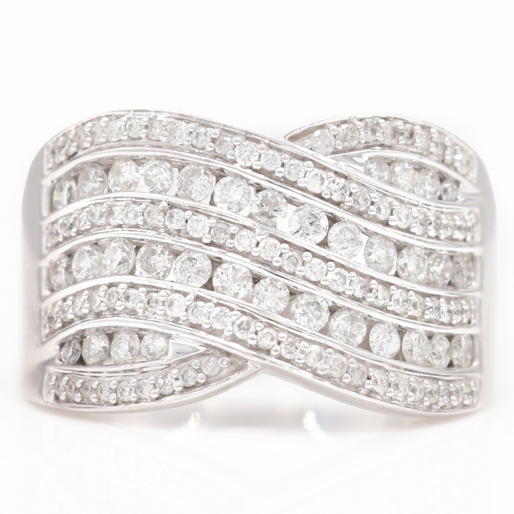 18ct white gold diamond wave design ring, channel and grain set with alternating rows of round brilliant cut diamonds, hallmarked, total diamond weight 1.00 carat