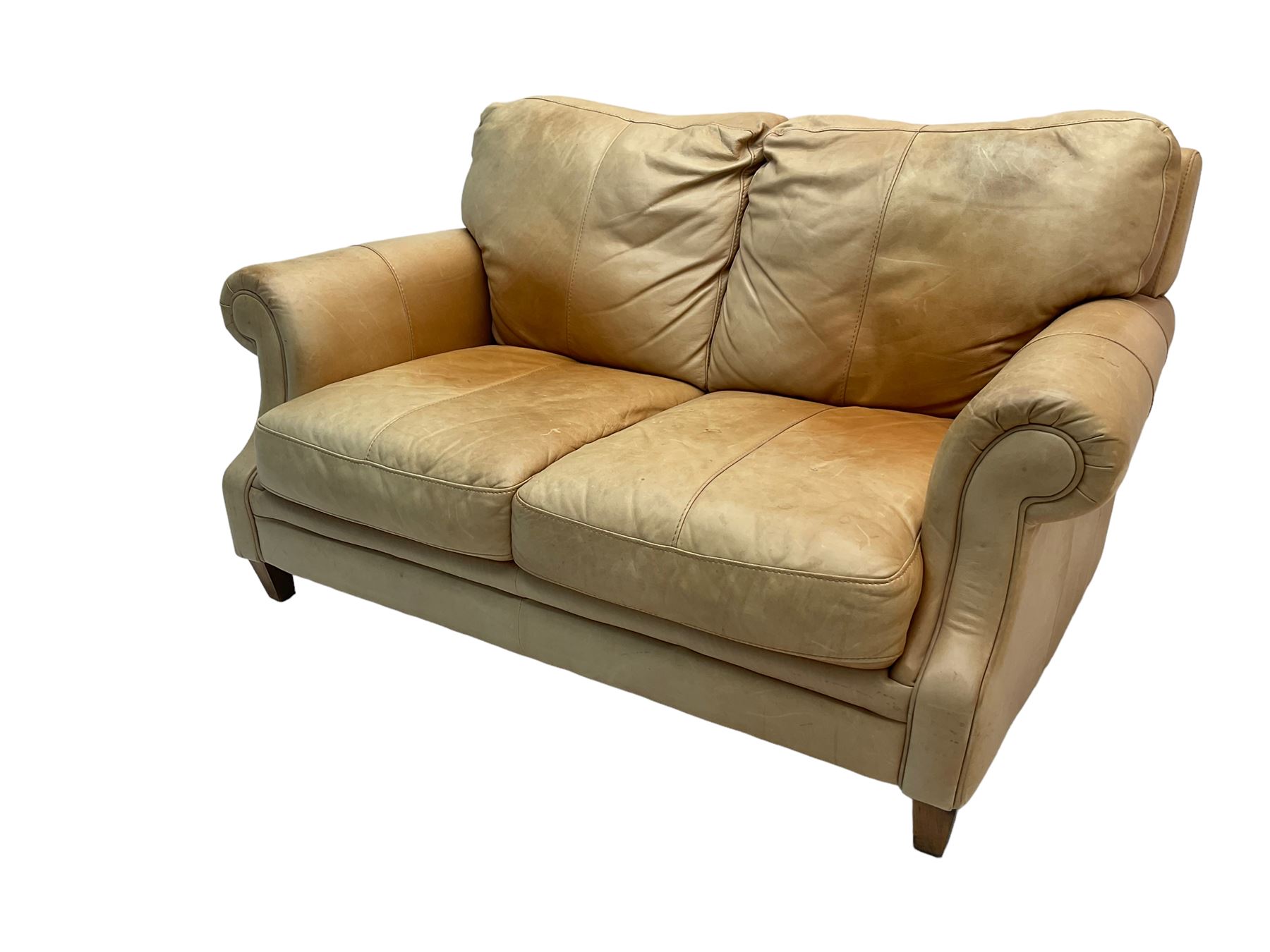 Two seat sofa, upholstered in pale tan leather with scrolled arms - The ...