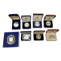 Eight cased silver coins, including Republic of Panama twenty Balboas proof coin, Jamaica 1974 ten dollars, United Kingdom Queen Elizabeth II 1993 proof crown etc