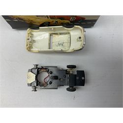 Various makers - Tri-ang Mini-Hi-Way Racing Car Series Le Mans No.9 racing car; Matchbox K-15 Merryweather Fire-Engine; Marx tin-plate Friction Helicopter; all boxed; and a Minic Motor Rally Adventure box containing a Jaguar Police car for spares or repair (4)