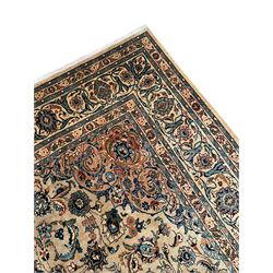 Persian Kashmar camel ground carpet, palmette rosette medallion on a field of curling leafy branches and stylised plant motifs, scrolling border decorated with further palmettes, within floral pattern guard stripes