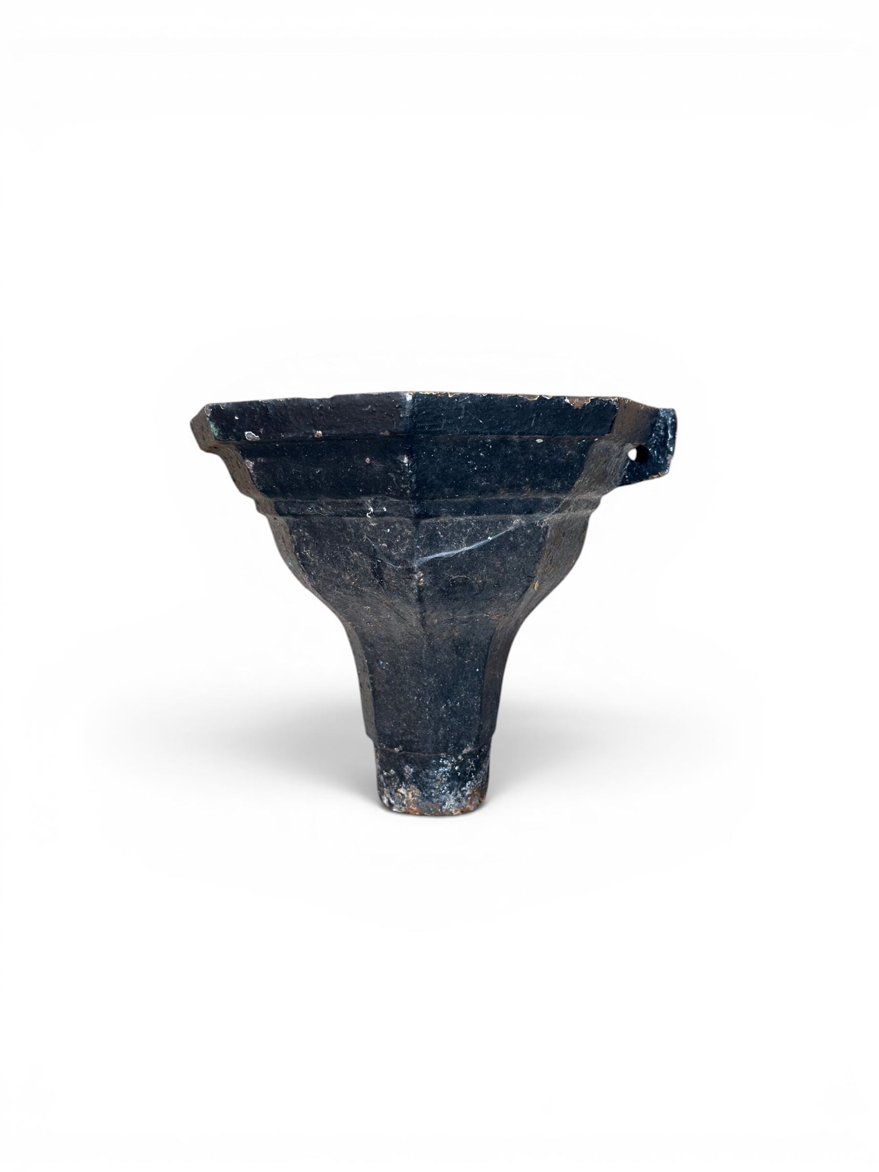 Four Victorian cast iron drain hoppers, various designs, painted in black and unfinished