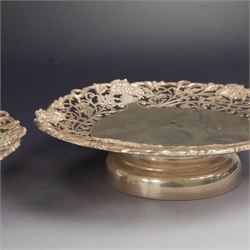 Pair of 1930s silver pedestal dishes, of circular form, the sides with pierced vine decoration, upon a domed pedestal foot, hallmarked Lee & Wigfull, Sheffield 1938, D21cm, H6cm