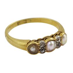 Early 20th century three stone split grey pearl ring, with four diamond accents set between, stamped 18ct 
