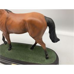 Beswick 'Mill Reef' horse figure, on a wooden plinth together with Beswick Ware horse figure 'Red Rum' on wood plinth, both with printed mark beneath