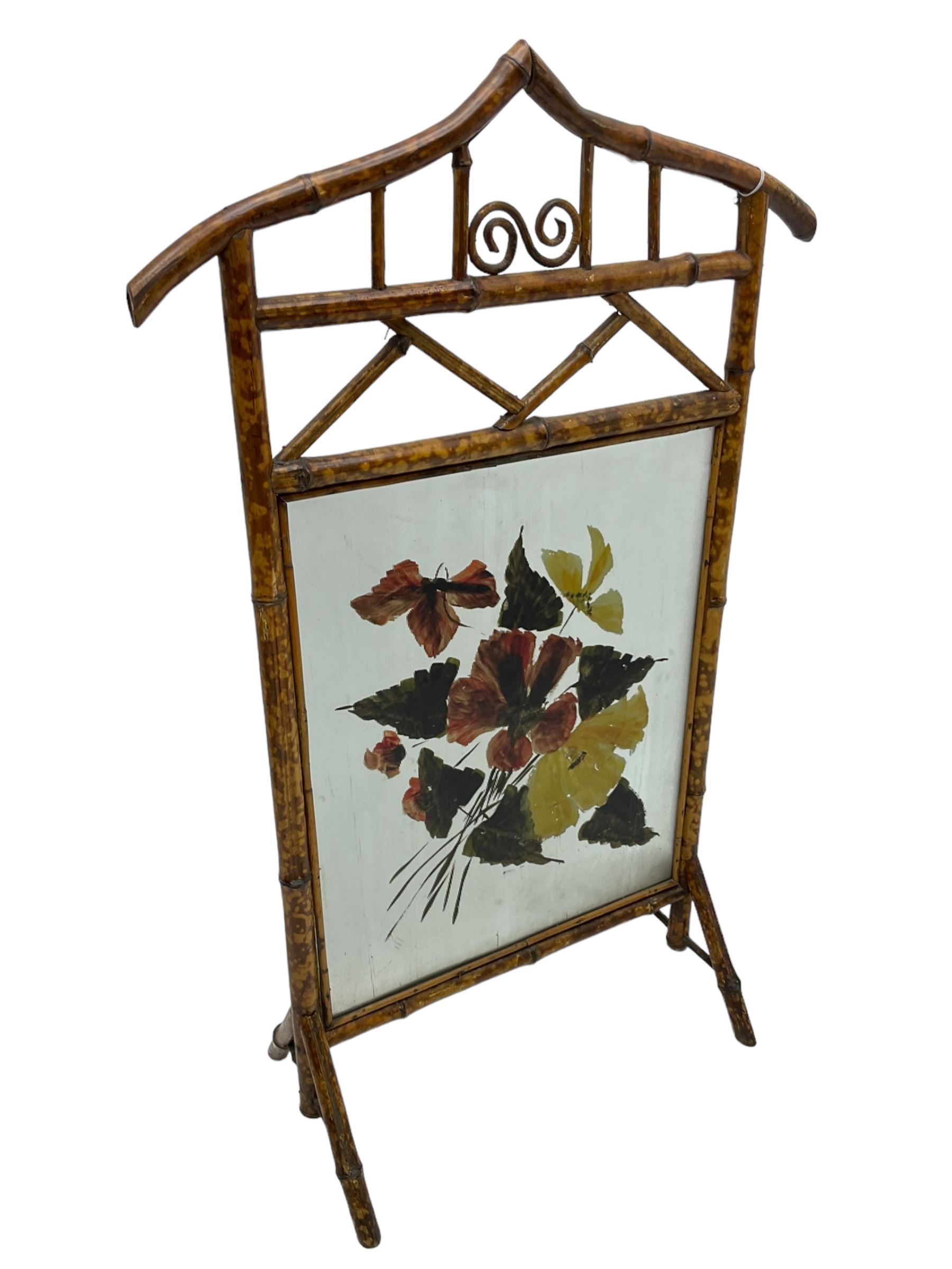 Victorian bamboo fire screen, pointed arched cresting rails over floral painted glass panel 