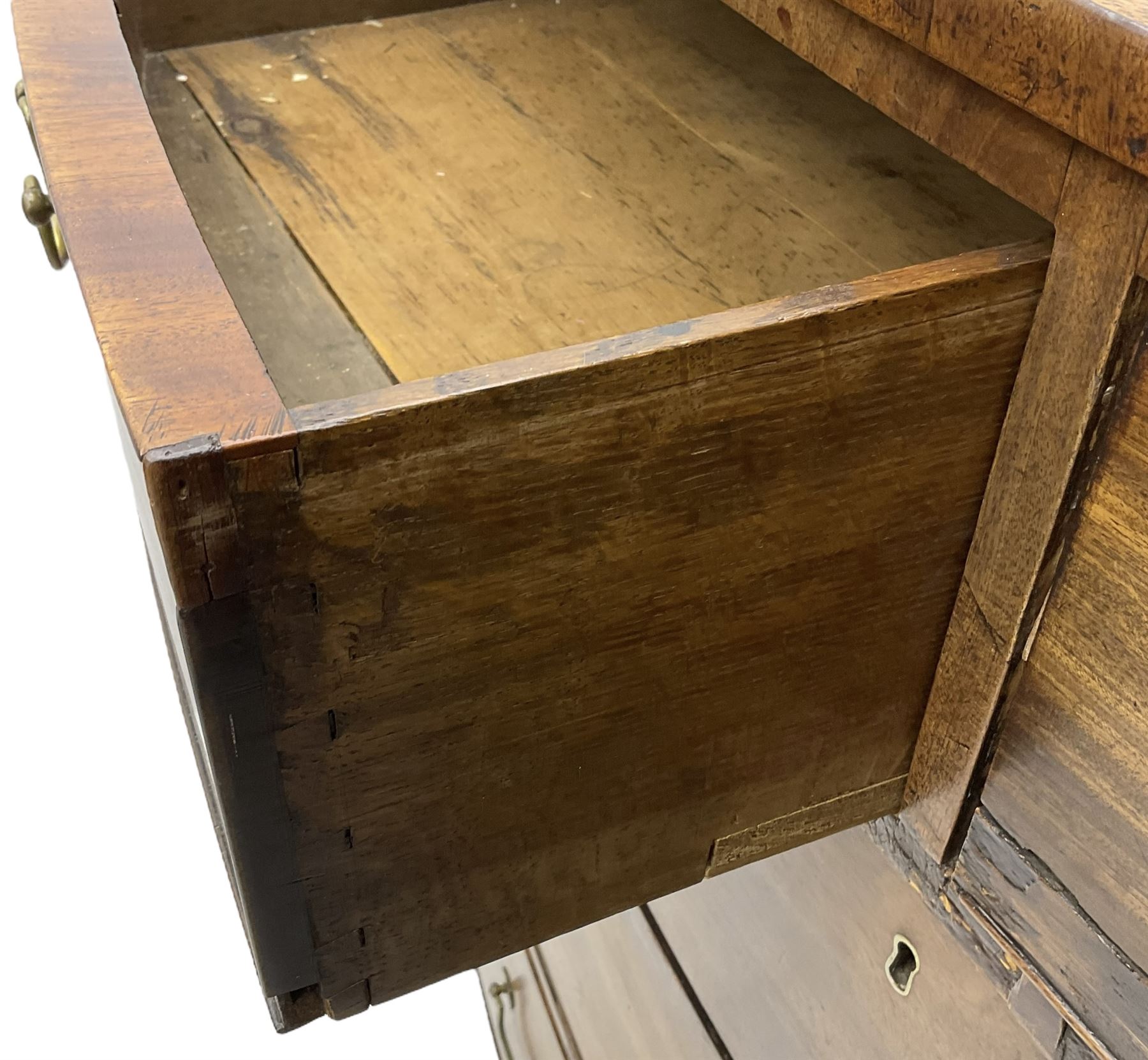 Early 19th century mahogany bow-front chest, fitted with two short over three long cock-beaded drawers, on splayed feet