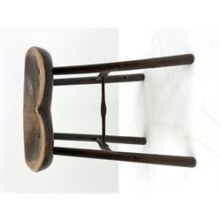 18th/19th century beech saddle stool, dished kidney shaped seat on tapered supports joined by turned H shaped stretchers