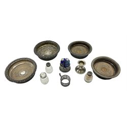 Four 19th century silver plated wine bottle coasters, together with hallmarked silver collared and lidded glass cruet trio and ornate silver cruet holder missing liner, with handle, and other silver plate etc