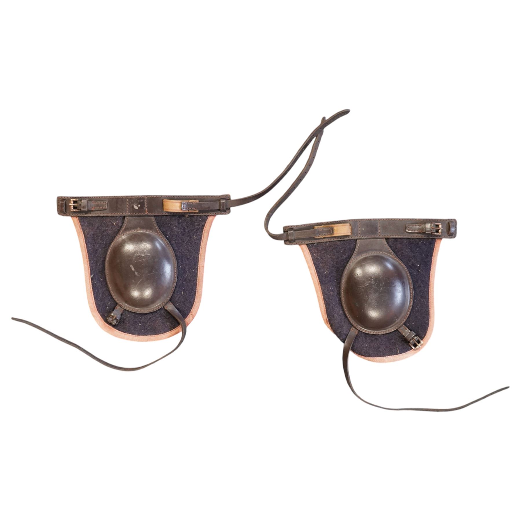 Set of Sabre brown leather brushing boots, together pair of knee protectors