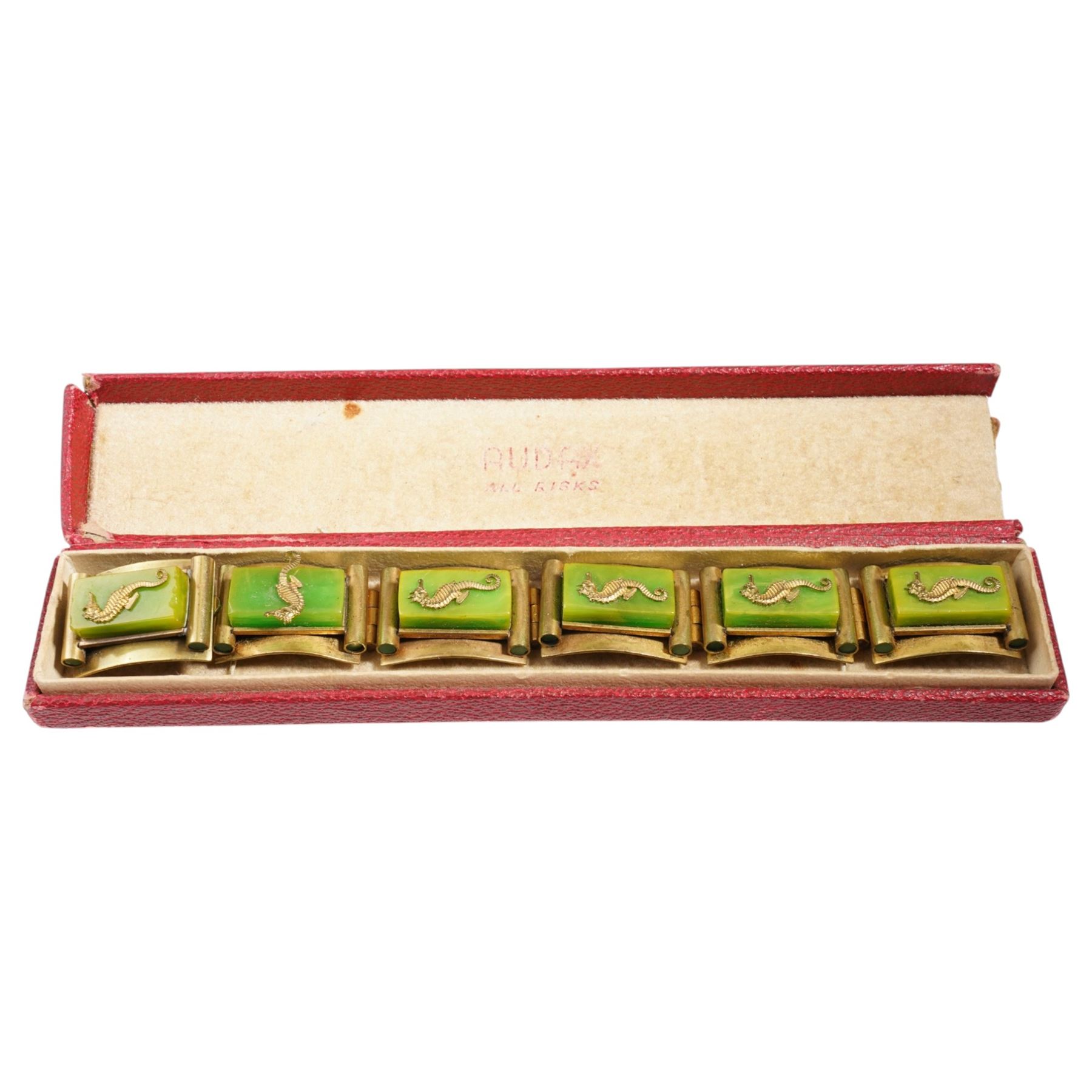 French Art Deco gilt metal and bakelite seahorse bracelet attributed to Jean Painleve, with matching clip