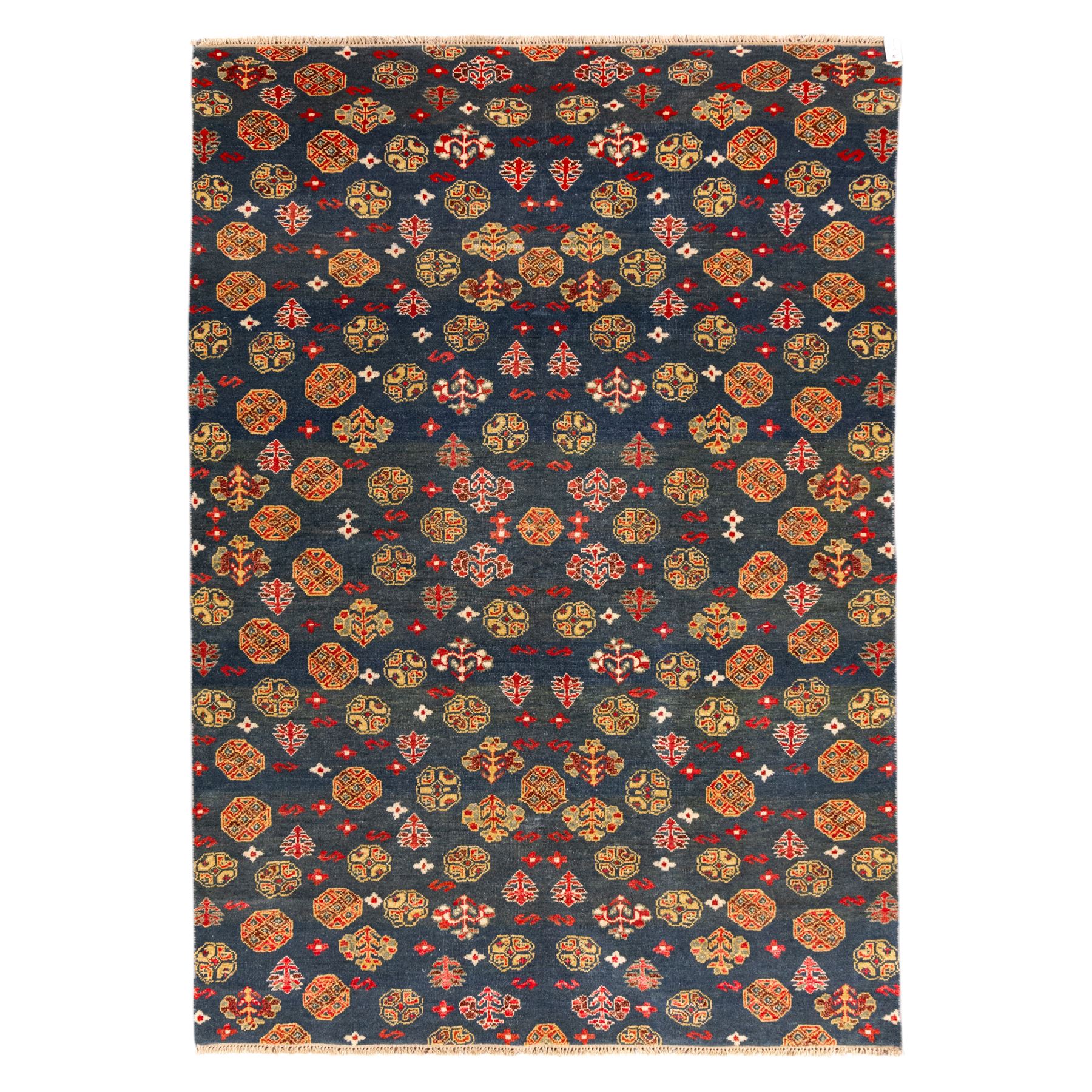 North East Persian Turkoman hand-knotted rug, deep teal blue field decorated with repeating rows of stylized octagonal guls and cruciform tribal motifs arranged in a lattice formation, enclosed composition featuring angular devices and reciprocal motifs, with cotton fringe ends