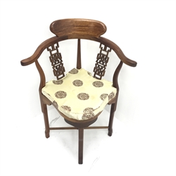 Chinese rosewood corner chair, carved and pierced splats, shaped seat, square supports joined by stretchers, W70cm
