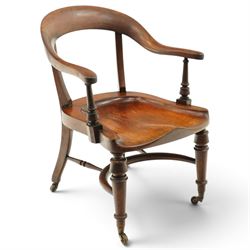 19th century carved mahogany Captain's desk chair, the bow-shaped cresting rail over curve...
