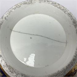 19th century continental bowl, decorated with hand painted floral sprays amongst gilt foliate decoration on a cobalt blue ground, D27.5cm