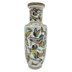 19th century Chinese Canton vase of slender baluster form, decorated with butterflies and floral panel to the neck, H30cm