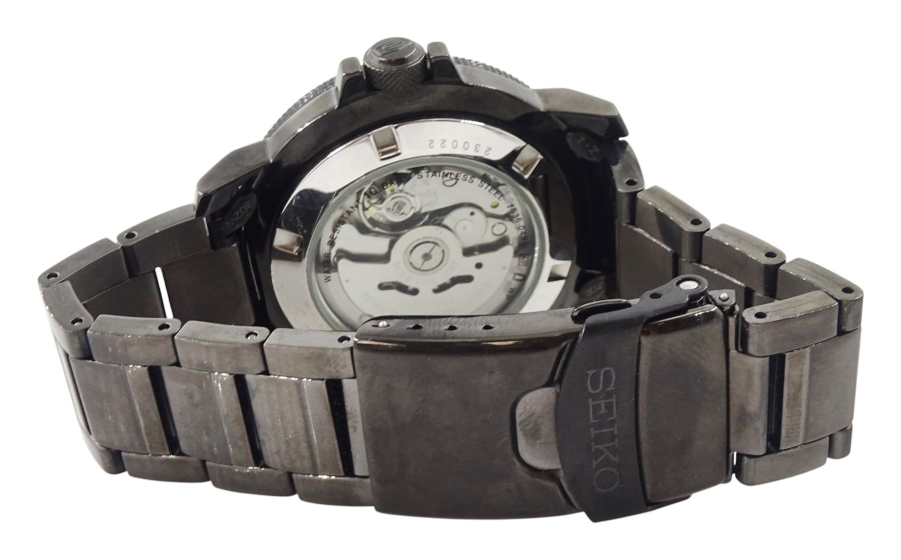 Seiko 5 Sports gentleman's stainless steel automatic wristwatch, Ref. 7S36-04N0, black dial with gilt baton hour markers and one other Seiko 5 Sports, Ref. 7S36-04X0, with grey dial and baton hour markers, both with day-date apertures and exhibition back cases, one boxed