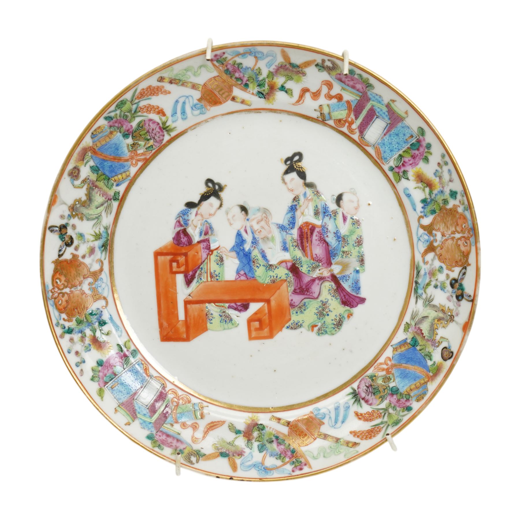 Pair of Chinese Canton famille rose plates, decorated to the border with goldfish books and other traditional symbols, central scenes of elderly figures, D19cm (2)