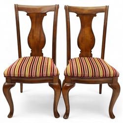 Willis & Gambier - mahogany extending dining table, rectangular top with rounded corners on cabriole legs, with two 35cm extension leaves, four Willis & Gambier upholstered high back chairs and four mahogany chairs, upholstered in a stripped multi-coloured velvet fabric, with scroll-shaped top rail, lyre-shaped back splat on cabriole legs, chairs W46xD91x97cm (11) 