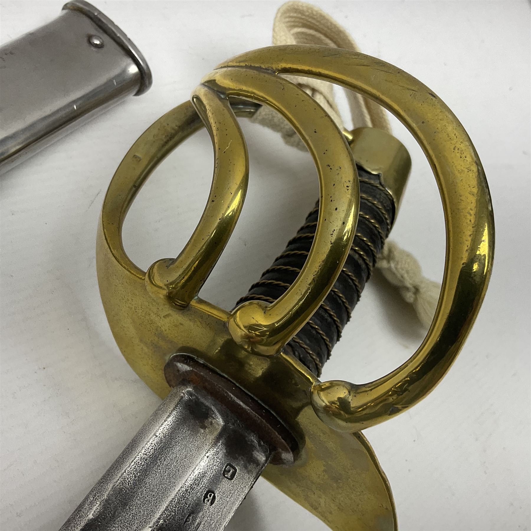 Early 19c French 1st Empire Heavy Cavalry trooper's sword, the 95.5cm double fullered blade with various stamped marks and inscribed Klingenthal 1814 to the back edge, four-bar brass hilt with wire-bound leather grip, knucklebow numbered 139; in polished steel scabbard with two suspension rings L117cm overall