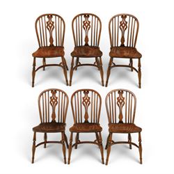 Set of six elm Windsor chairs, saddle seats with crinoline stretchers