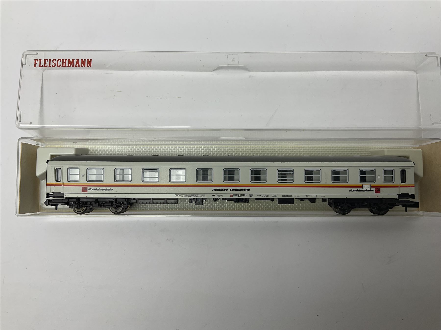 Fleischmann ‘N’ gauge ‘Piccolo’ - sixteen carriages, wagons and cars comprising nos. 8051, 8052, 8055, 8064, 8119K, 8127, 8128, 8129, 8202, 8211, 8224, 8240, 8281, 8301, 8500, 9372; along with Minitrix N503 Shock Van and 13576 6 ton Mineral Wagon; boxed and loose (18) 