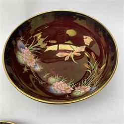 A large Carlton Ware Rouge Royale bowl, the interior decorated with dragonflies, lilies and bulrushes in enamel and gilt, with marks beneath, D25.5cm, together with a Carlton Ware Rouge Royal dish, decorated with grape vines, with marks beneath, L21.5cm. 