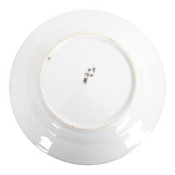 Near pair of Japanese plates, decorated in green, blue and iron-red enamels, with peacocks perched on a rock among foliage, together with Chinese cinnabar ginger jar, plates D21cm 