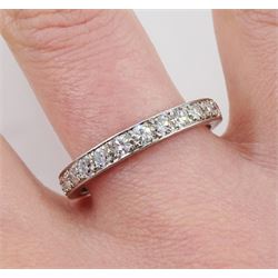 Early-mid 20th century platinum channel set diamond half eternity ring,  with engraved decoration to the sides and shank, stamped Platinum