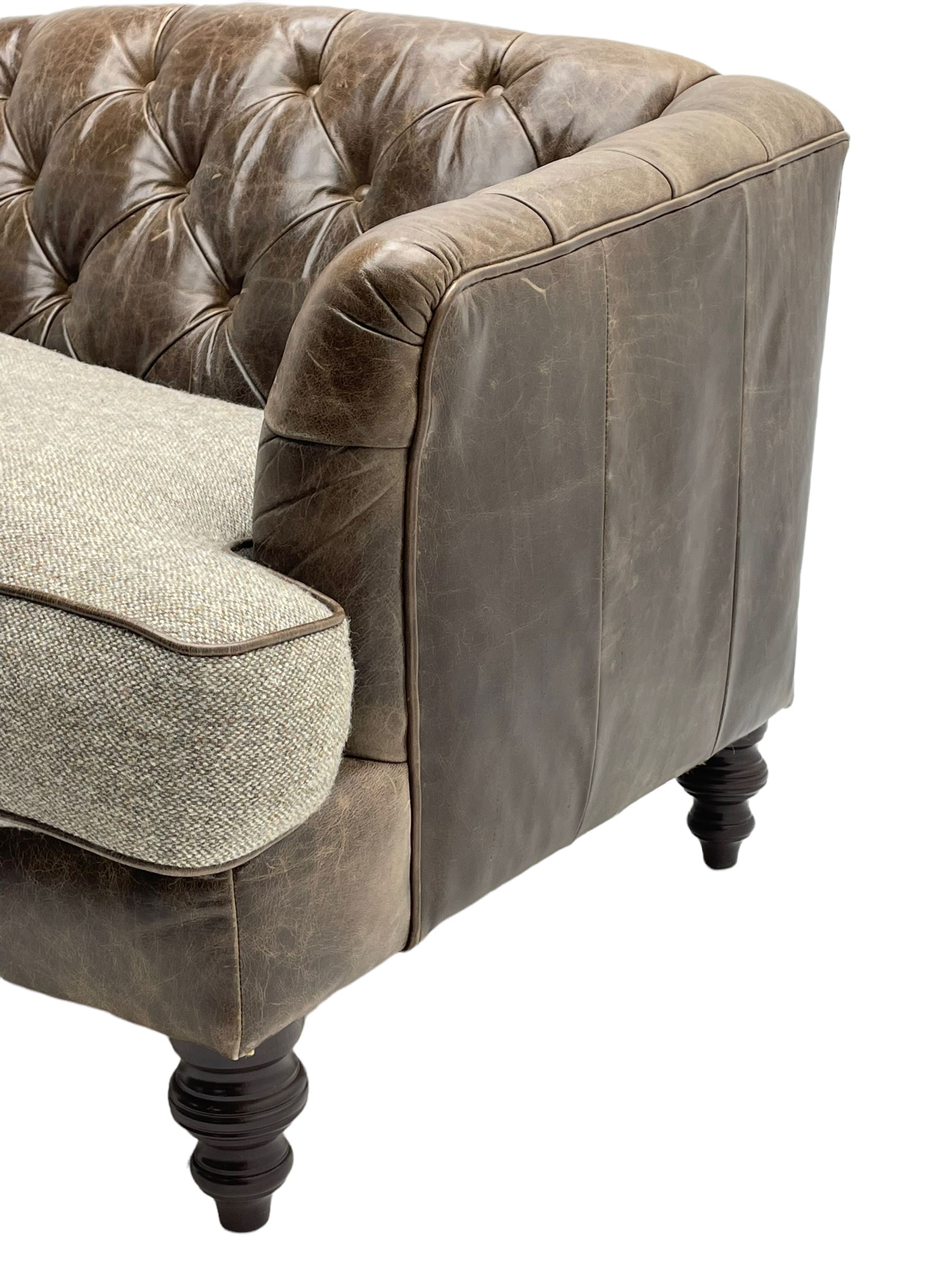 Tetrad - 'Dalmore' traditional shaped two seat sofa, upholstered in buttoned brown leather with contrasting wool seat cushions, together with scatter cushions, on turned front feet