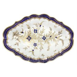 18th century Caughley dessert dish, of lozenge form hand painted with Dresden flowers type pattern, with central gilt and cobalt blue floral spray, within a cobalt and gilt border, with crescent mark beneath, L26.5cm
