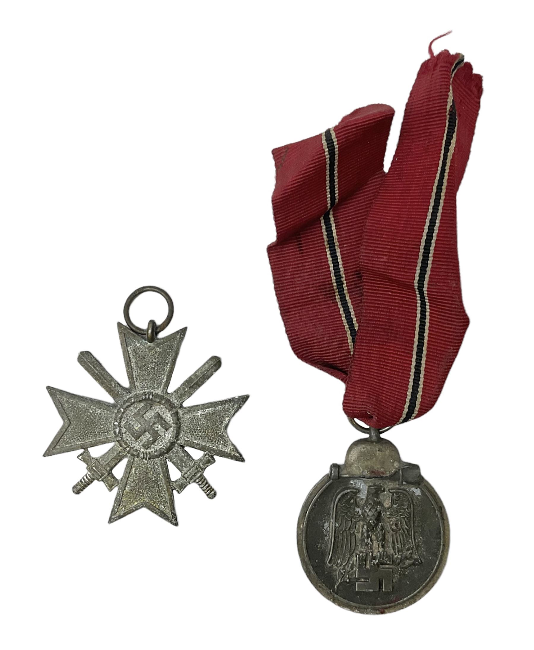 WW2 German Eastern Front Medal awarded to those who served on the German Eastern/Russian Front during the Winter Campaign period of 15th November 1941 to 15th April 1942 with original ribbon; and German War Merit Cross with swords 2nd Class (2)