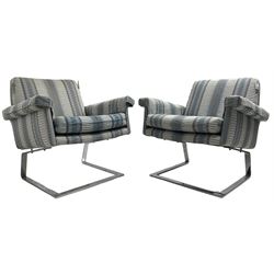 Pair of mid-20th century cantilever armchairs, upholstered in striped blue and silver fabric, raised on a chrome base