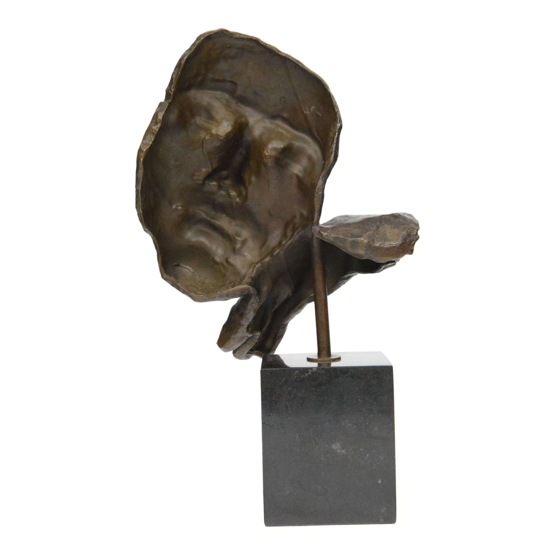 After Salvador Dali (Spanish 1904-1989): Dreams, bronze figure with head resting on hand H39cm