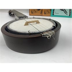 W.D. Keech banjolele pat.219720/23 with etched signature to the back; serial no.A12082 L55cm; and a restored Italian mandolin with segmented lute back; together with three music books