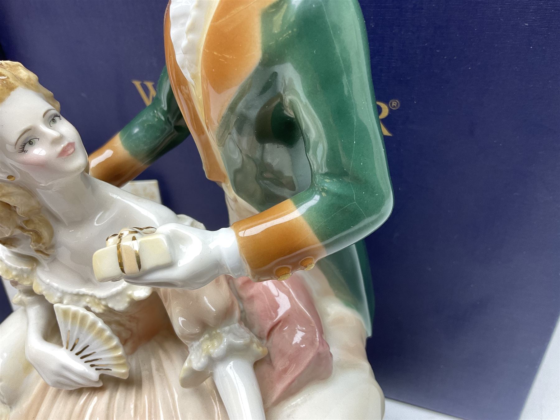 Two Royal Worcester figures, comprising A Gift of Love from the Age of Romance Series, limited edition 325/500, with certificate and original box and Royal Premier from the Glittering Occasions series, with original box 