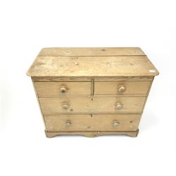Victorian stripped pine chest, two short and two long drawers, shaped plinth  base