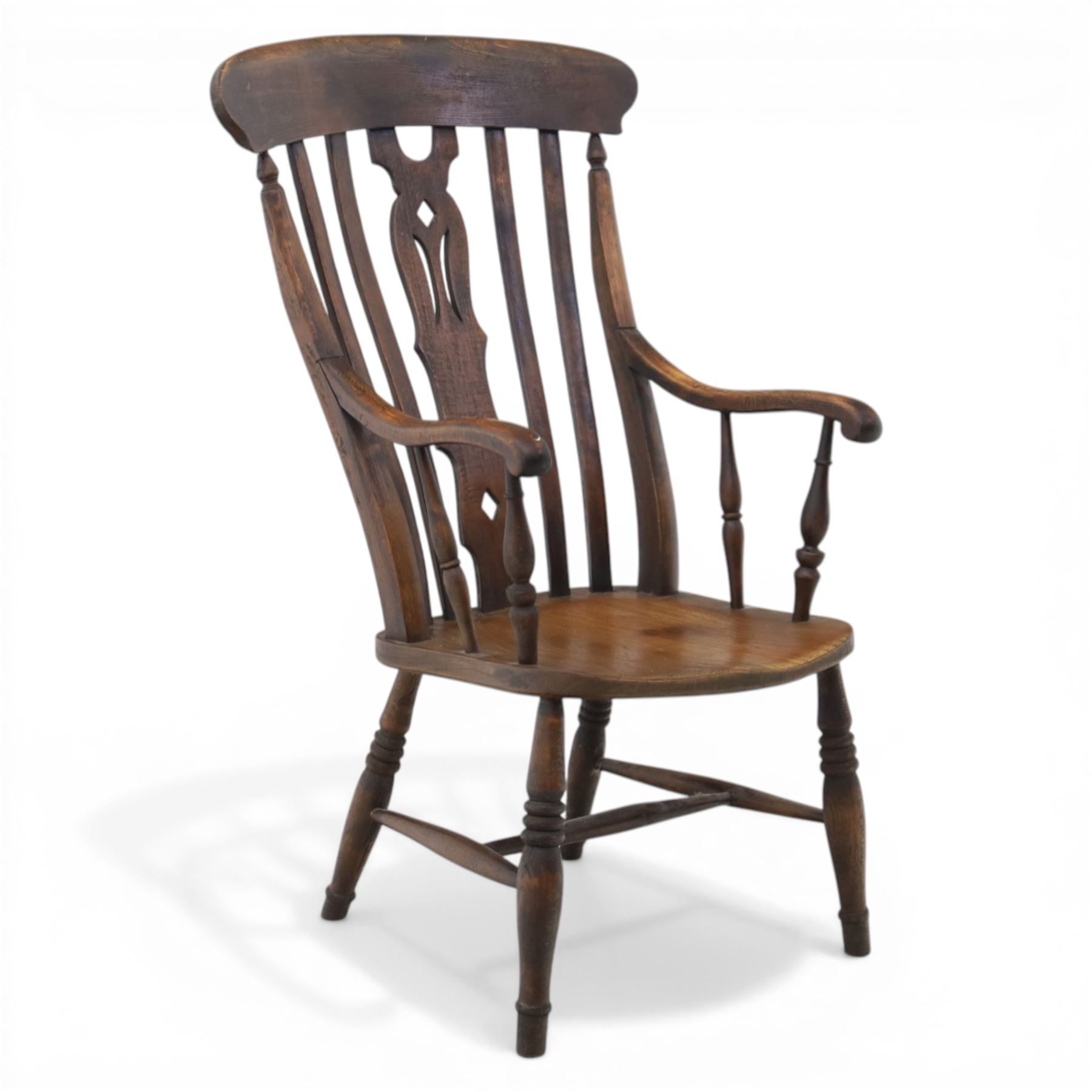 Traditional design elm farmhouse chair, a vase splat flanked by turned spindles, on turned supports united by a H stretcher