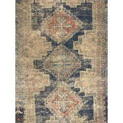 Antique Caucasian rug, indigo ground field decorated with three lozenge medallions within borders of stylised bird and flower head motifs