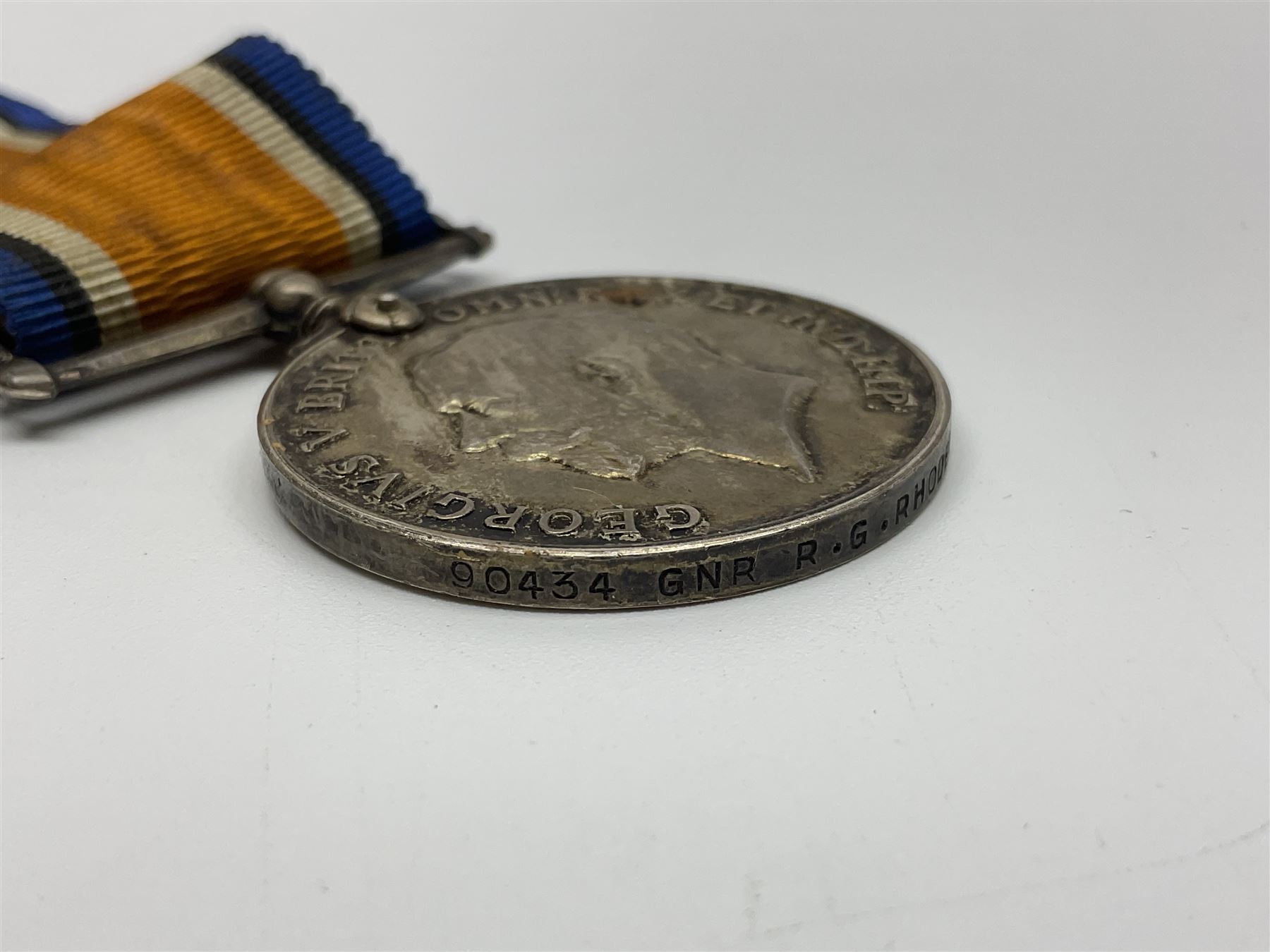 WW1 group of three medals comprising British War Medal, Victory Medal and 1914-15 Star awarded to 90434 Gnr. R.G. Rhodes R.F.A./R.A.; all with ribbons