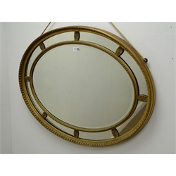  Ornate oval gilt bevel edge wall mirror (W62cm, H82cm) and an arched rectangular mirror with gilt detailing (2)  