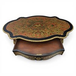 Late 19th century boulle work centre table, shaped serpentine top decorated with brass inlay on red tortoiseshell ground within ebonised border, fitted with single frieze drawer, on cabriole supports with gilt metal mounts and mask terminals