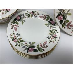 Wedgwood Hathaway Rose pattern tea and dinner wares, comprising twelve saucers, sixteen teacups, twenty tea plates, jug, sucrier, thirteen shallow bowls, sauce boat and saucer, two lidded tureens, larger jug, ten dinner plates, nine smaller plates and two large oval serving dishes
