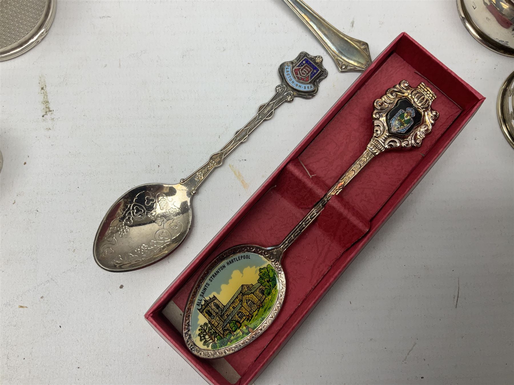 Group of silver to include cased set of six silver handled knives hallmarked Birmingham 1921 by Raeno Silver Plate Co, three hallmarked napkin rings etc together with silver plated and other metalware etc