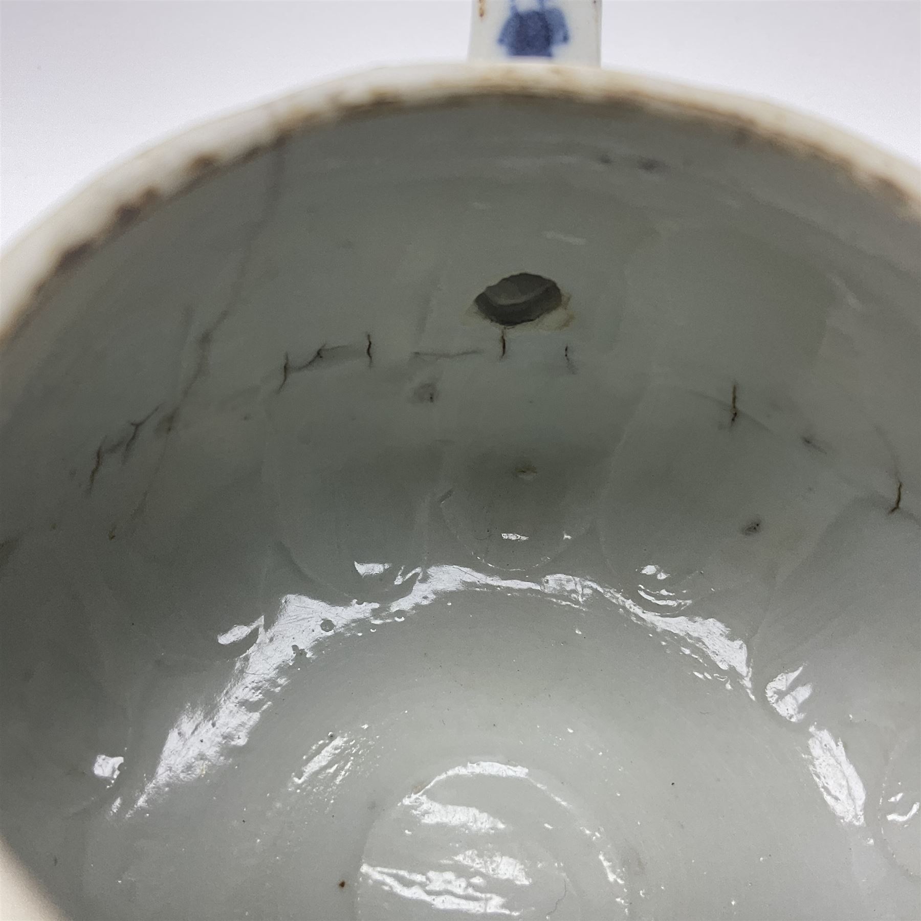 18th century Chinese blue and white teapot, painted with floral sprays, with lobed body and cover, H11cm